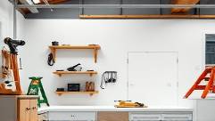 thick polyethylene sheets, smooth, cut into square pieces, photorealistic, a small workshop with scattered tools and wooden furniture, highly detailed, uniform cuts, 50mm lens, semi-opaque white, balanced daylight